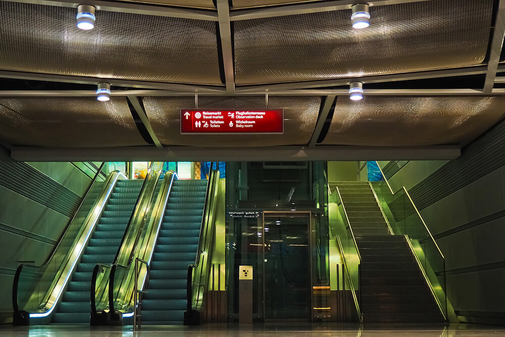 A set of escalators, an elevator, and stairs