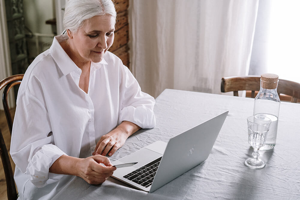 Older woman using laptop