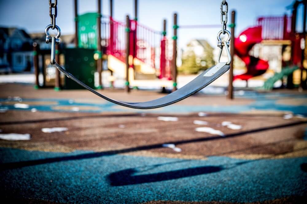 Swingset seat in playground